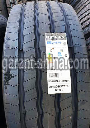 Kelly Armorsteel KTR2 (прицепная) 385/65 R22.5 164K(158L) 24PR HL - Фото протектора с этикеткой вблизи на улице